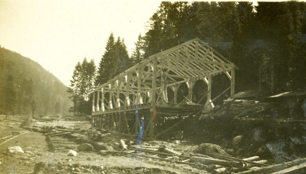 a timber framed building under construction