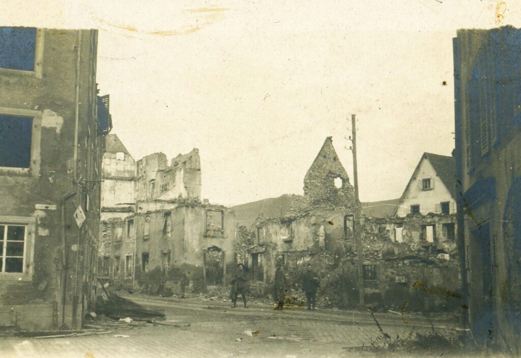 a street in a French village with bomb damage